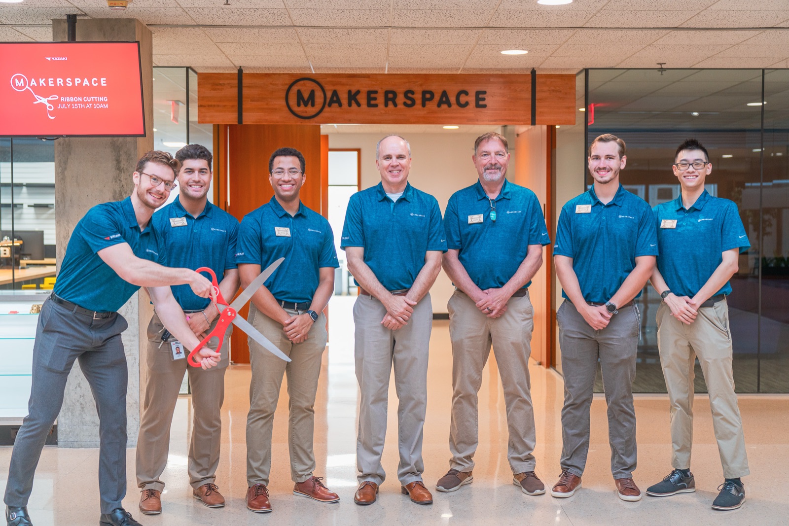 Makerspace team in blue polos at the entrance
