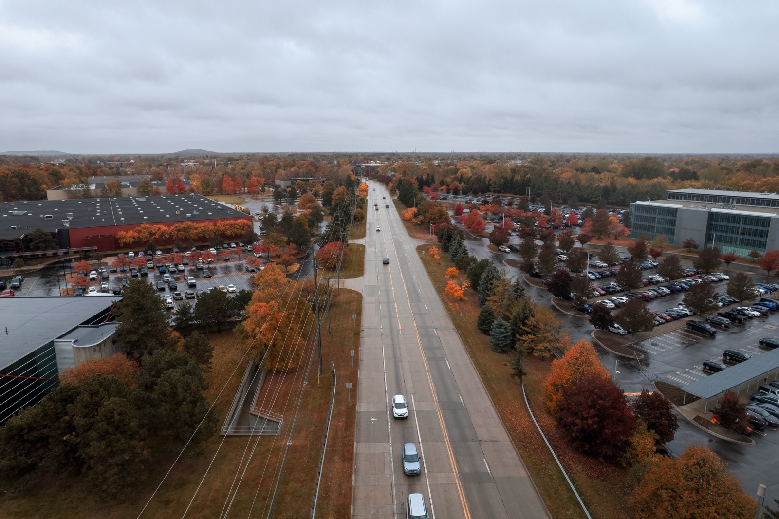 Yazaki campus and highway at dusk from a drone